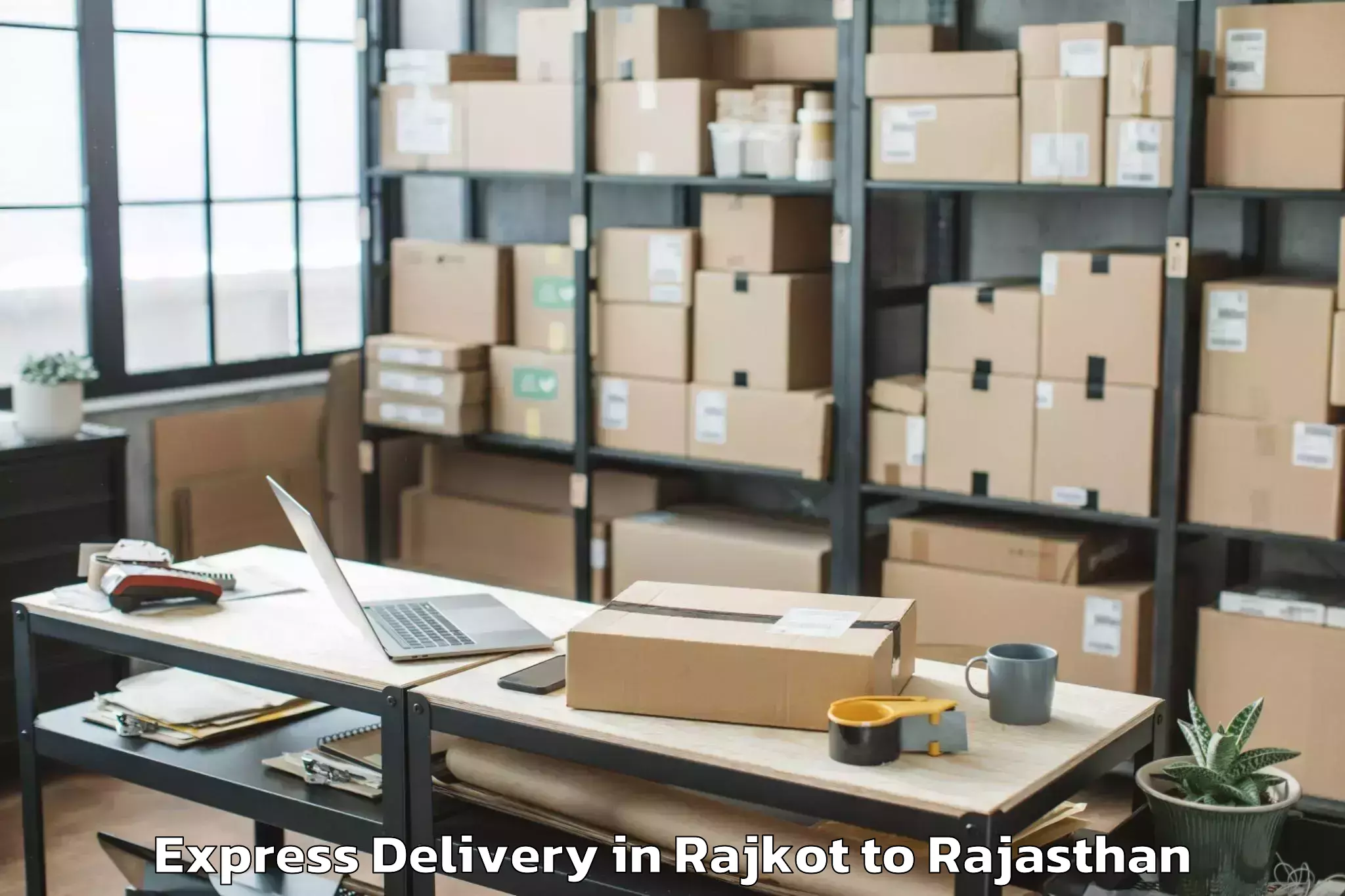 Professional Rajkot to Niit University Neemrana Express Delivery